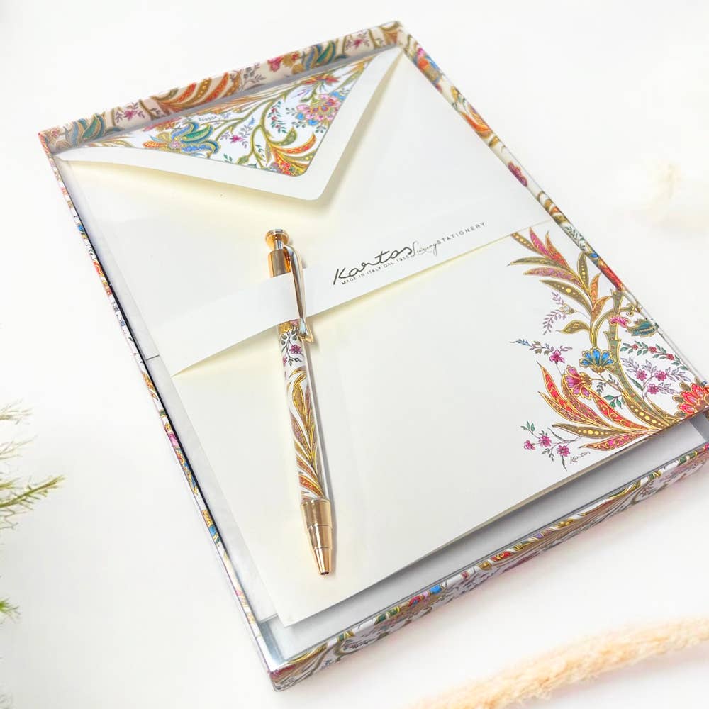 Pen set with floral design in a decorative box on a white background
